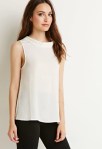 Forever 21 Dotted Bow Blouse ($15)