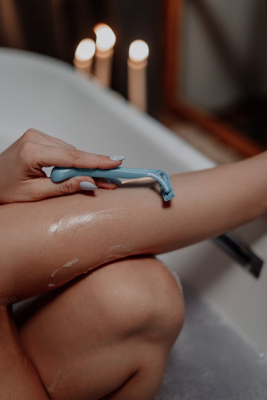 person with blue nail polish