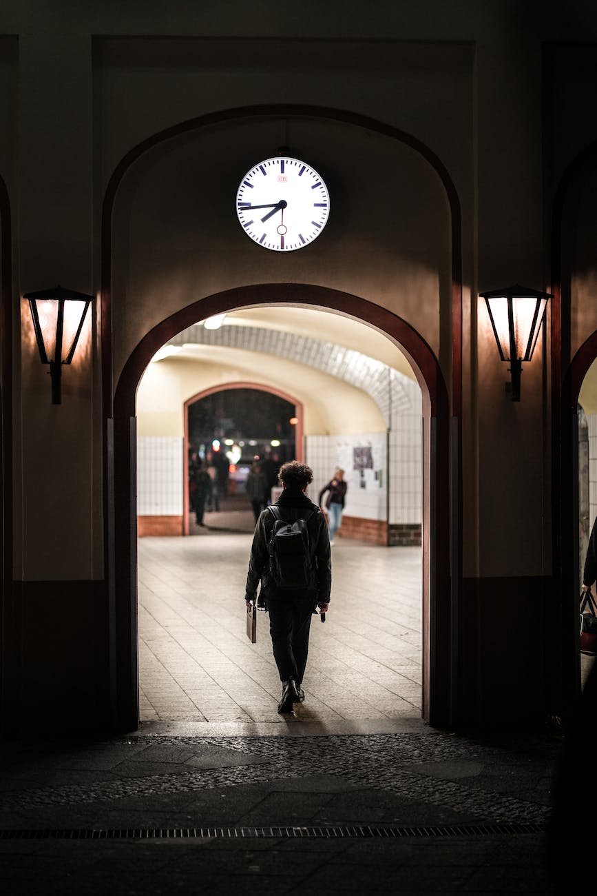 man in a tunnel on railway station