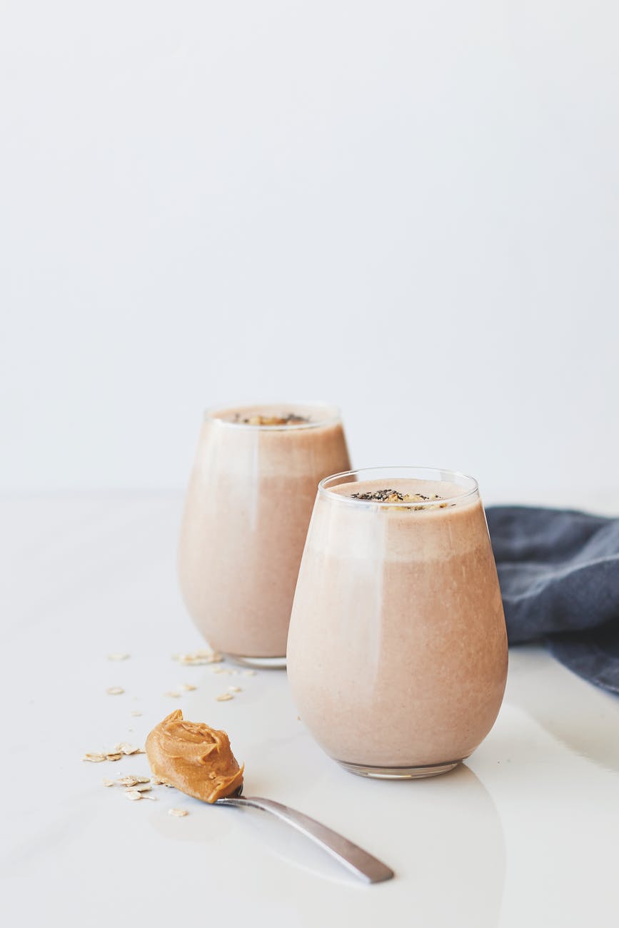 peanut smoothie on stylish glasses